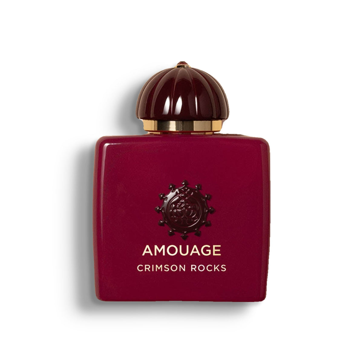 AMOUAGE CRIMSON ROCKS single perfume bottle on pure white with a soft left-down tabletop shadow