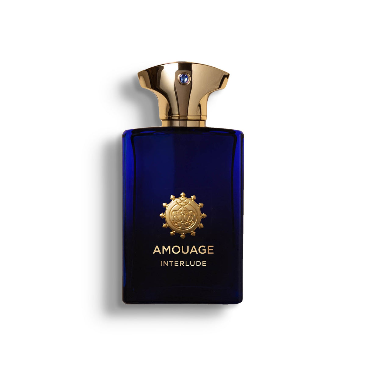 AMOUAGE INTERLUDE single perfume bottle on pure white with a soft left-down tabletop shadow