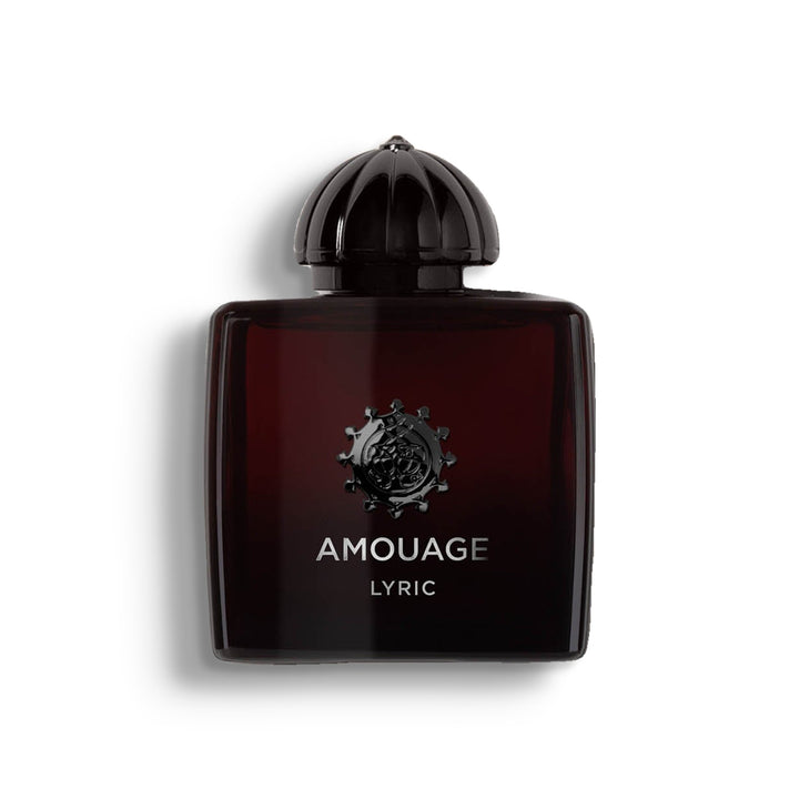 AMOUAGE LYRIC WOMAN single perfume bottle on pure white with a soft left-down tabletop shadow