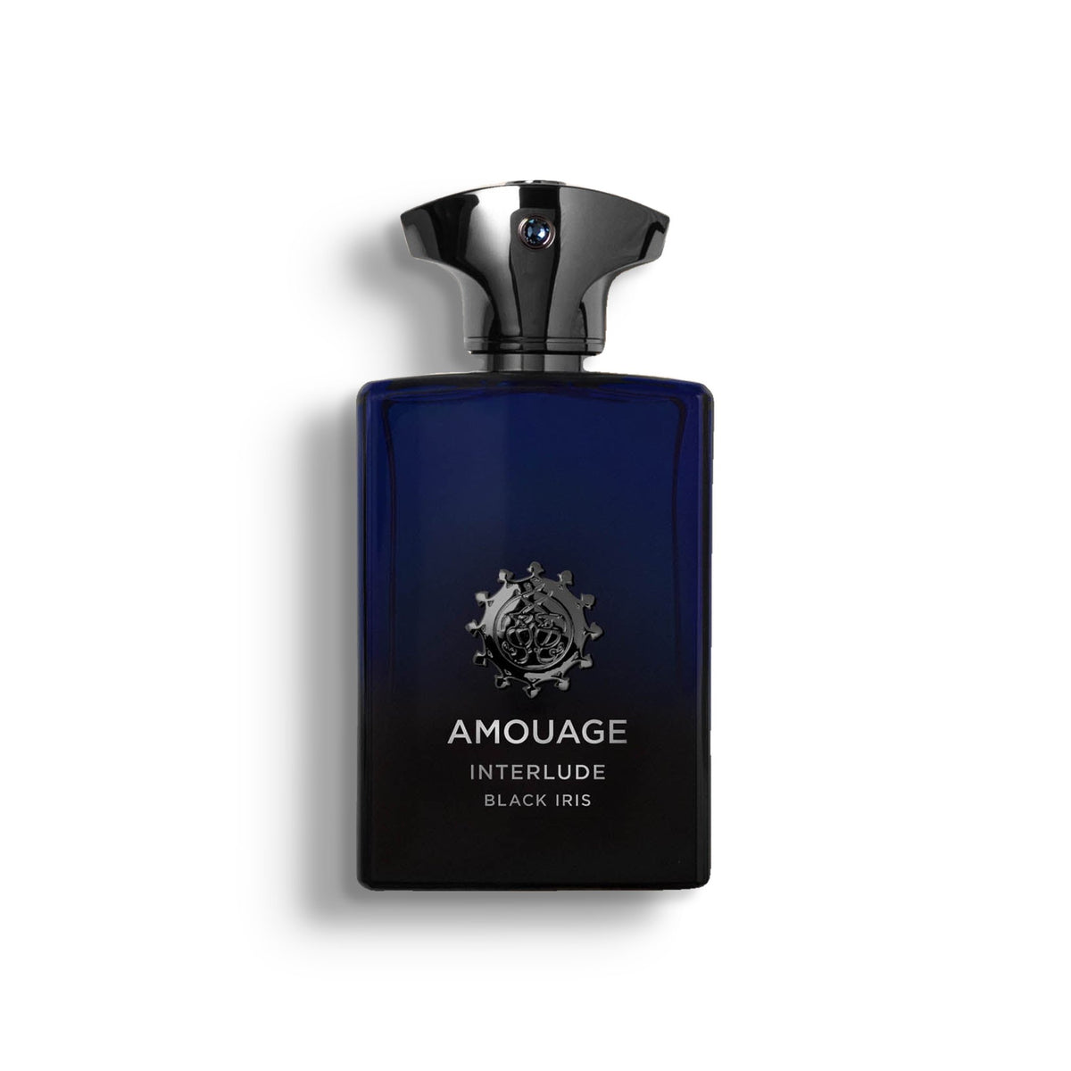 AMOUAGE INTERLUDE BLACK IRIS MAN single perfume bottle on pure white with a soft left-down tabletop shadow